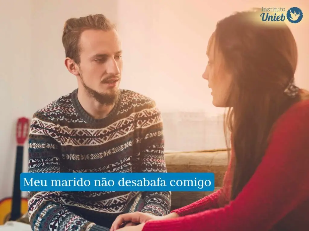 Homem e mulher sentados de frente um para o outro em uma conversa difícil